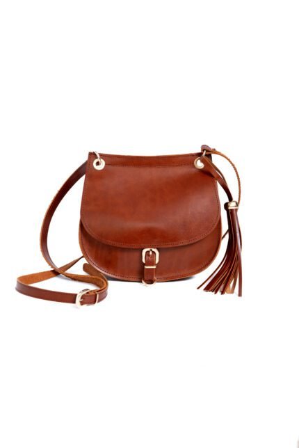 Handmade leather saddle bag with buckle and tassel detail