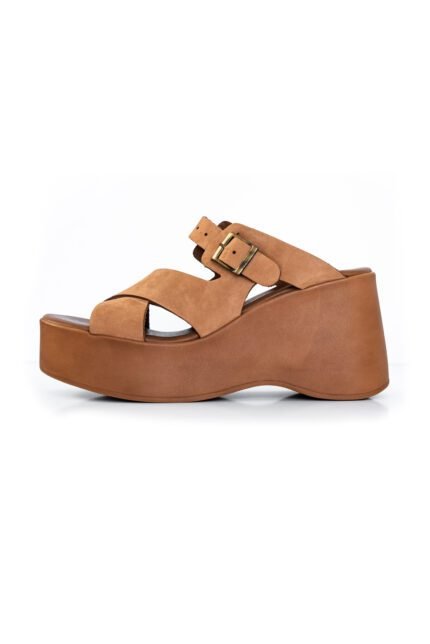 Beige Handcrafted leather wedge sandals for women with double buckle straps and chunky platform heel.