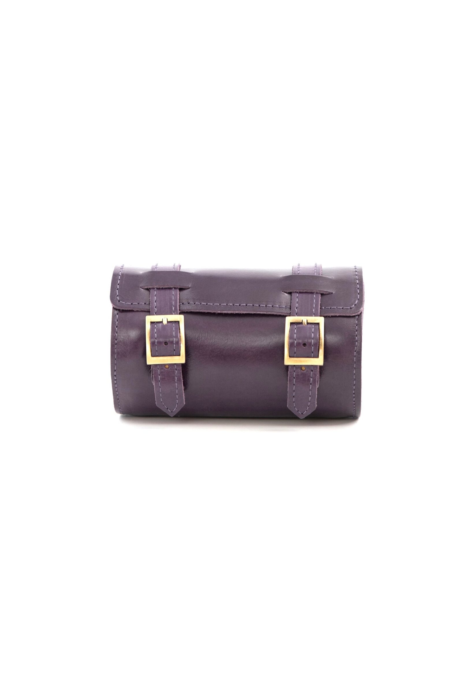 purple Leather roll satchel with buckle closure and structured silhouette Purple Leather roll satchel with buckle closure and structured silhouette by Jirakis Leather.