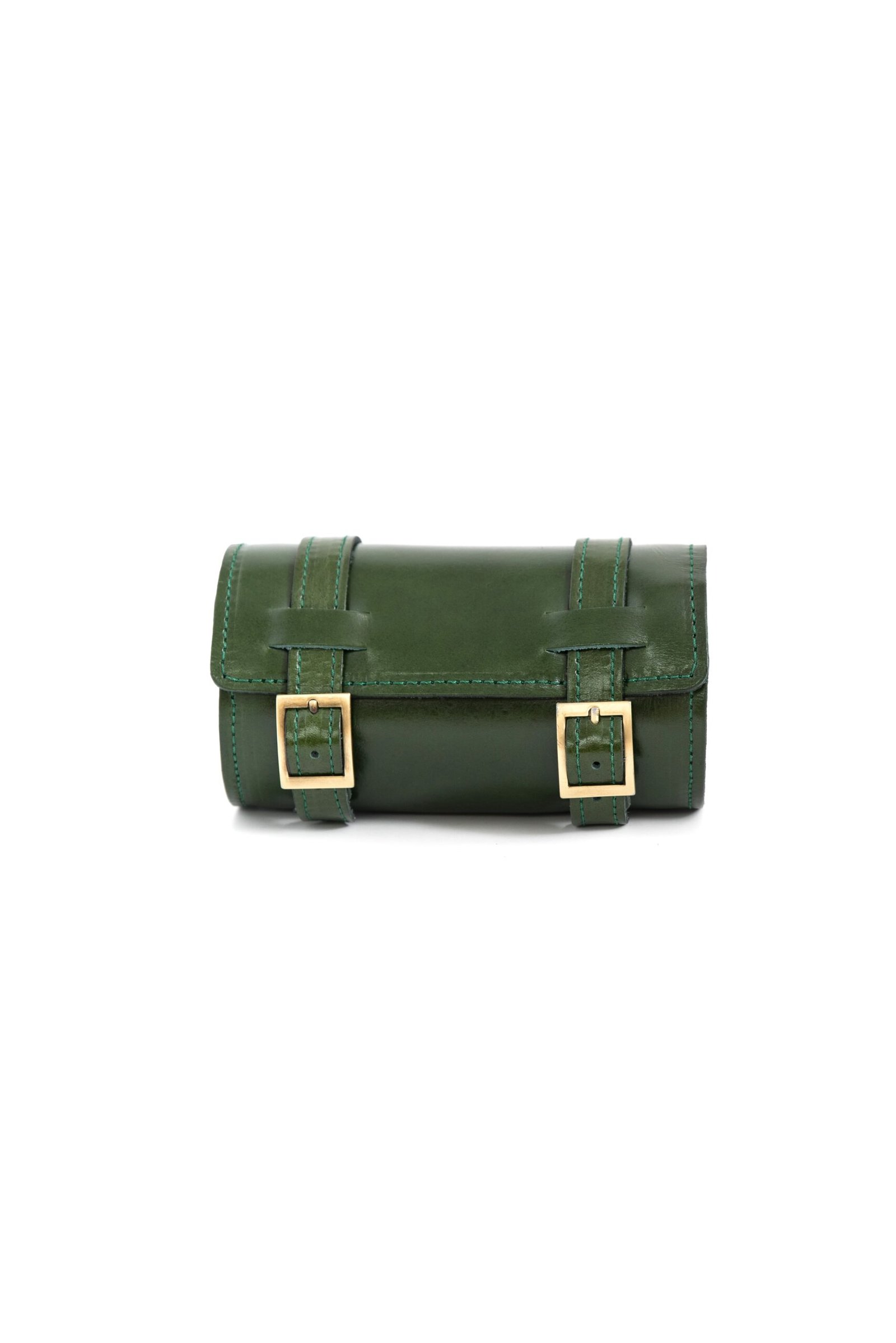 green Handcrafted leather mini roll bag with buckle strap and tube shape green Handcrafted leather mini roll bag with buckle strap and tube shape by Jirakis Leather.