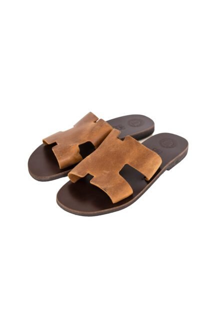 Handcrafted brown leather sandals for men with broad cutout upper, inspired by Greek design - sideview