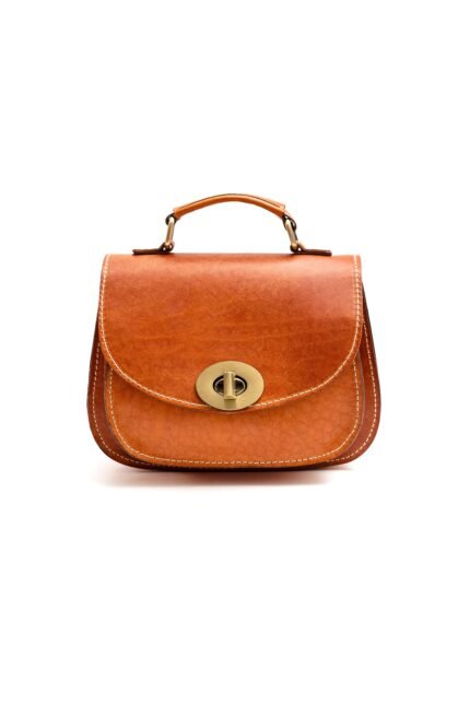 tan wax Leather mini satchel bag for women with buckle flap and structured shape by Jirakis Leather.