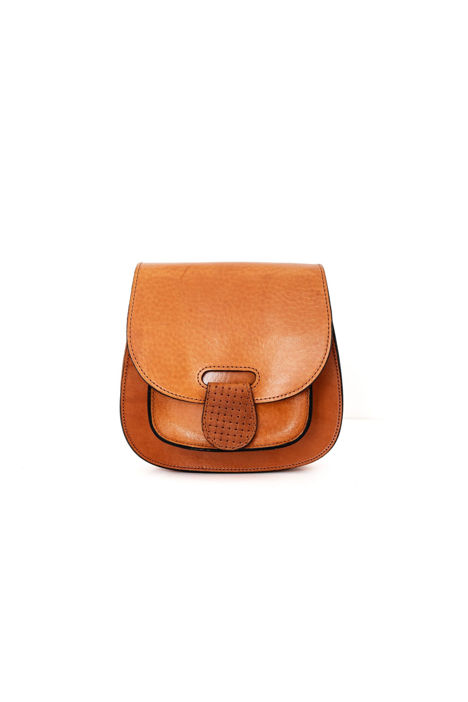 leather-saddle-bag-tan Medium size leather saddle bag with flap and tab, handcrafted in Crete by Jirakis Handcrafted Leather