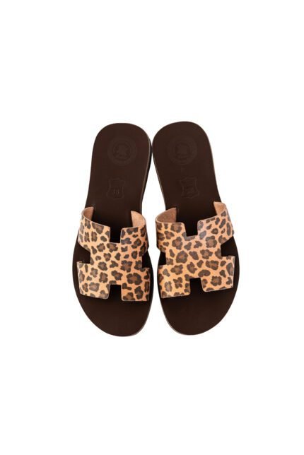 Handcrafted animal print leather flats for women by Jirakis, stylish open-toe slip-on sandals.